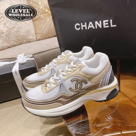 Chanel CC Runner Gold Laminate Sneaker