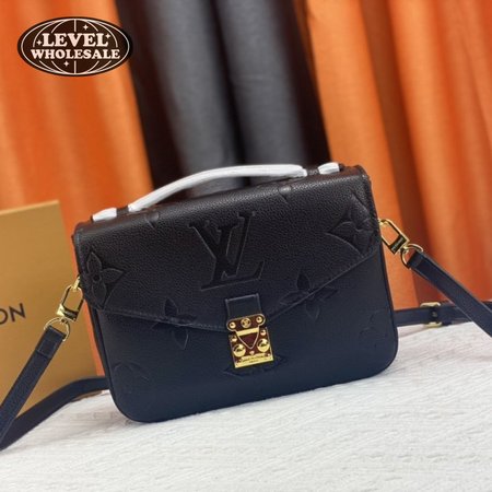 pochette metis black monogram empreinte leather with gold